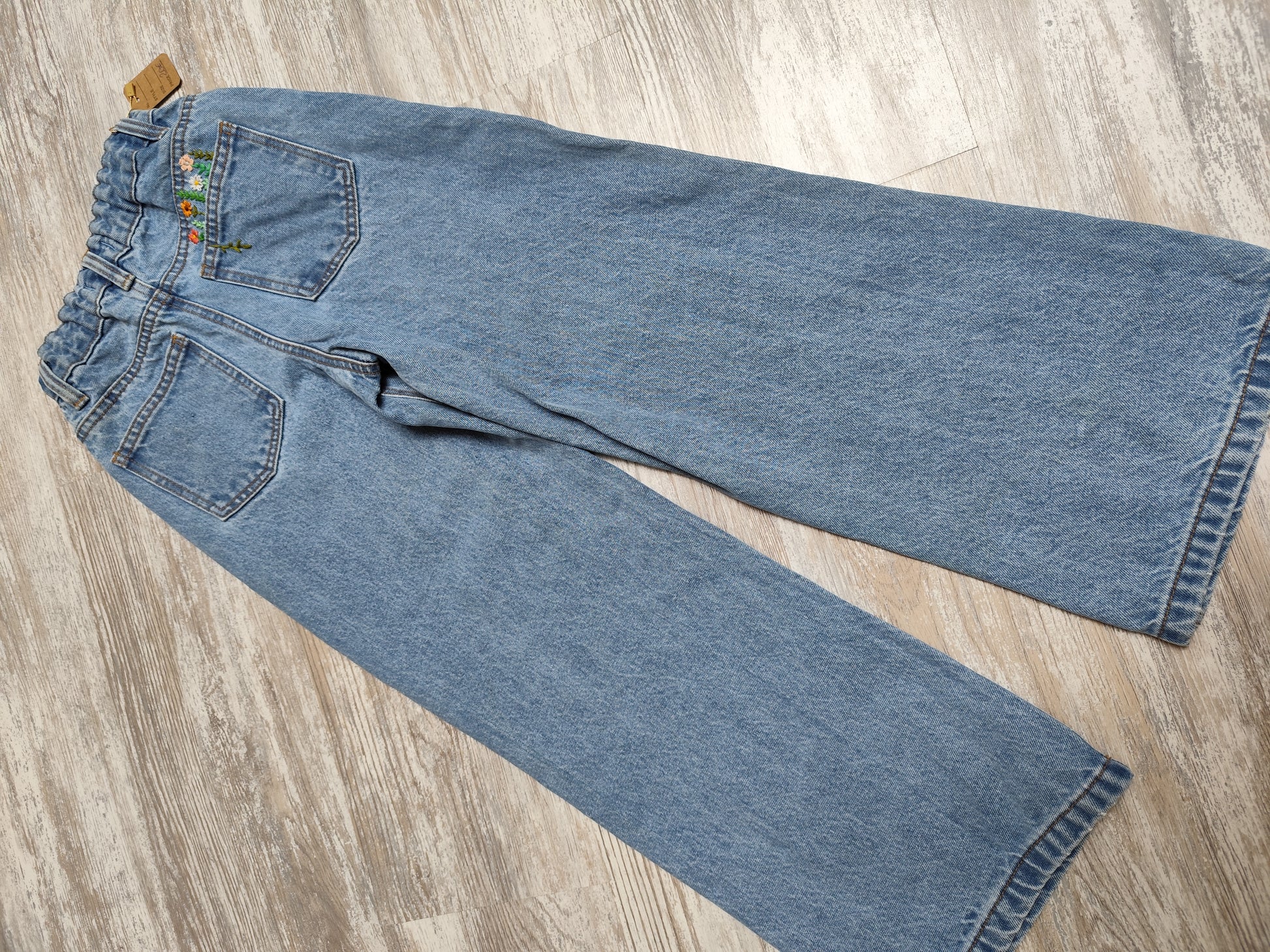 Jean Jambes large brodé poche arrière florale (10ans)